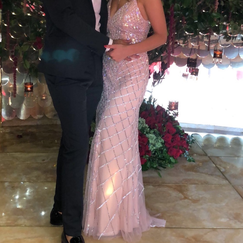 Beautiful pink JOVANI dress. Worn only once to my bridal shower. Size 2.